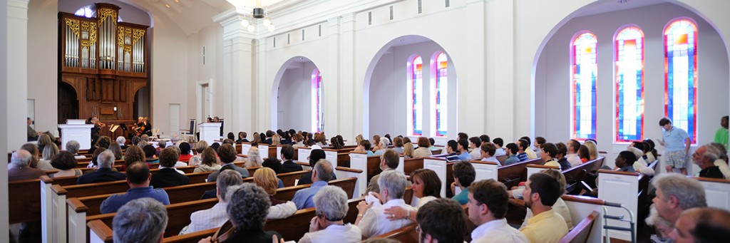 people seated inside the chapel